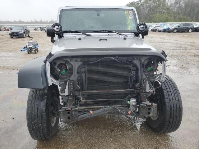 Photo 5 from auction – 2016 JEEP WRANGLER U with VIN 1C4BJWDG9GL136278