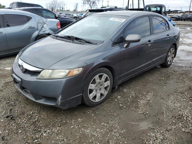 HONDA CIVIC LX 2011 with VIN 2HGFA1F5XBH302878 - Photo from auction