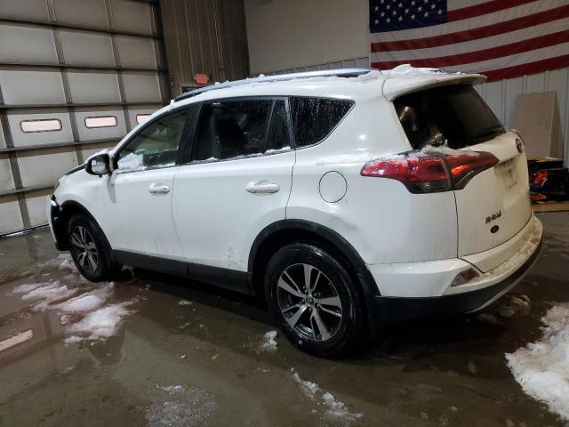 Photo 2 from auction – 2017 TOYOTA RAV4 XLE with VIN JTMRFREV5HD205655