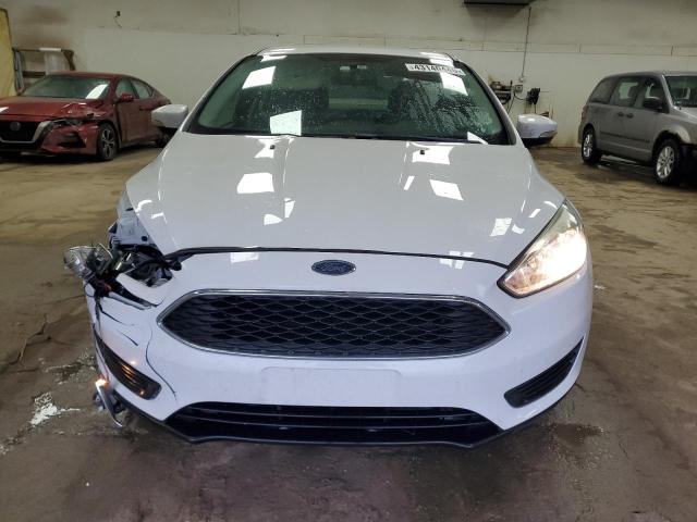 Photo 5 from auction – 2015 FORD FOCUS SE with VIN 1FADP3F20FL313084