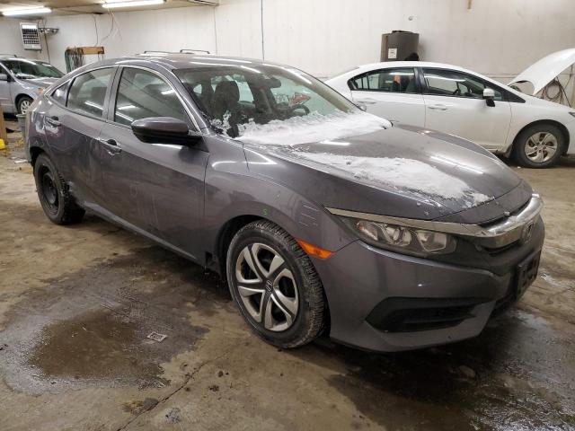 Photo 4 from auction – 2018 HONDA CIVIC LX with VIN 2HGFC2F56JH572219