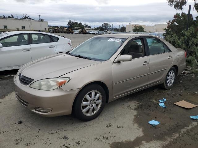 TOYOTA CAMRY LE 2002 with VIN JTDBE30K420067006 - Photo from auction