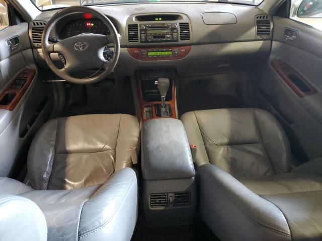 Photo 8 from auction – 2003 TOYOTA CAMRY LE with VIN 4T1BF30KX3U059706