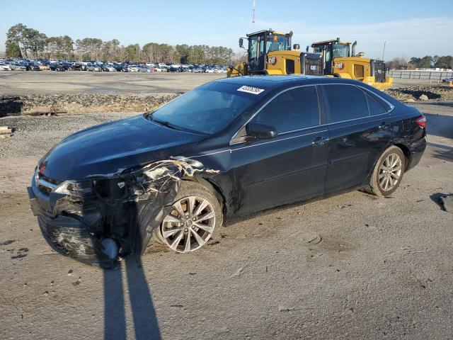 TOYOTA CAMRY LE 2016 with VIN 4T1BF1FK4GU604879 - Photo from auction
