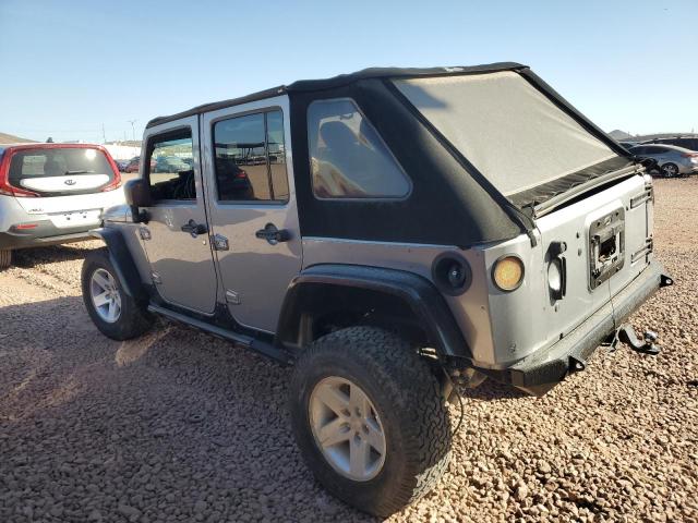 Снимка 2 от търг – 2015 JEEP WRANGLER U с VIN 1C4BJWFG0FL644229