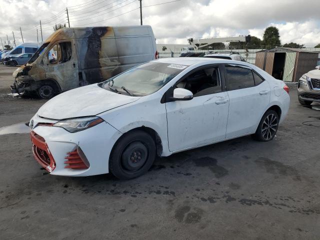 TOYOTA COROLLA L 2019 with VIN 5YFBURHE5KP864312 - Photo from auction