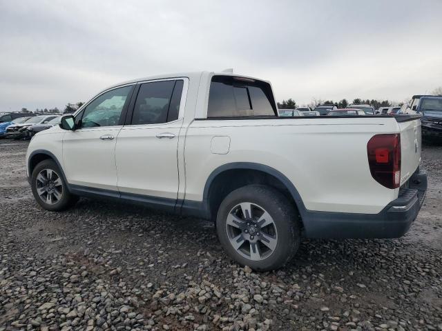 Photo 2 from auction – 2017 HONDA RIDGELINE with VIN 5FPYK3F72HB031824
