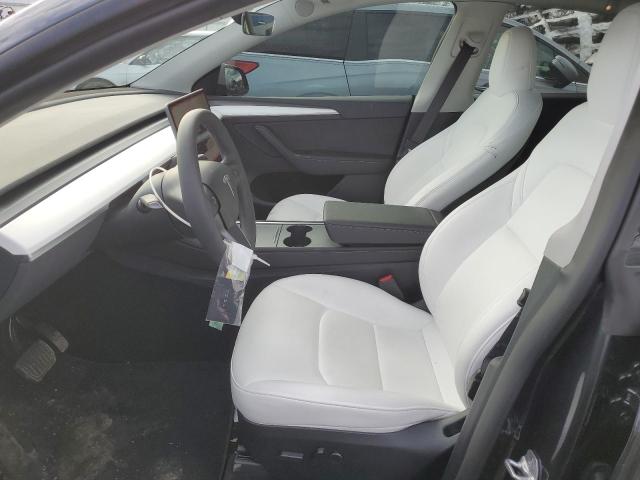 Photo 7 from auction – 2024 TESLA MODEL Y with VIN 7SAYGAEEXRF990438