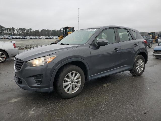 MAZDA CX-5 SPORT 2016 with VIN JM3KE2BY8G0793154 - Photo from auction