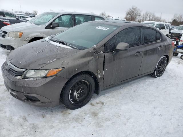 HONDA CIVIC LX 2012 with VIN 2HGFB2F54CH003990 - Photo from auction