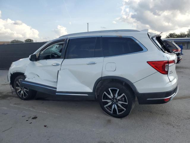 Photo 2 from auction – 2021 HONDA PILOT ELIT with VIN 5FNYF6H00MB064376