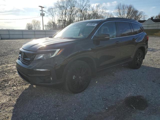 HONDA PILOT SE 2022 with VIN 5FNYF6H27NB077435 - Photo from auction