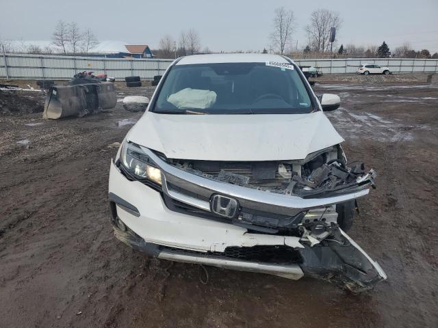 Photo 5 from auction – 2021 HONDA PILOT EX with VIN 5FNYF6H34MB022447
