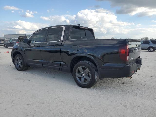 Photo 2 from auction – 2023 HONDA RIDGELINE with VIN 5FPYK3F57PB057879
