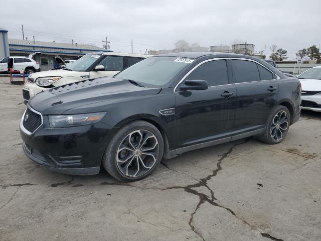 FORD TAURUS SHO 2014 with VIN 1FAHP2KT4EG116744 - Photo from auction