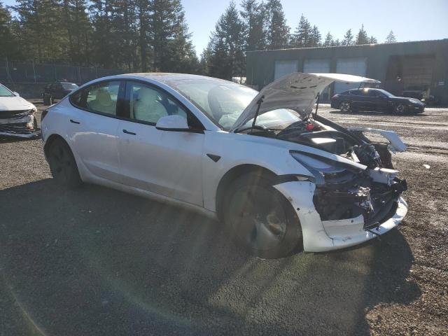 Снимка 4 от търг – 2021 TESLA MODEL 3 с VIN 5YJ3E1EA5MF928934