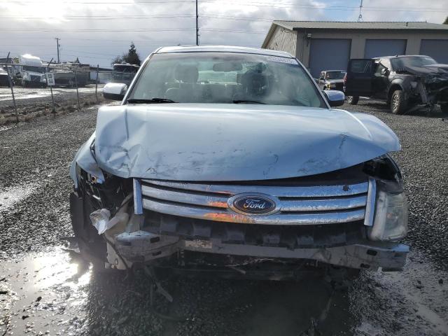 Photo 5 from auction – 2009 FORD TAURUS LIM with VIN 1FAHP25W09G118549