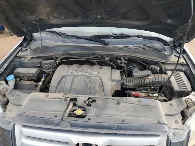 Photo 11 from auction – 2006 HONDA PILOT EX with VIN 2HKYF18506H525160