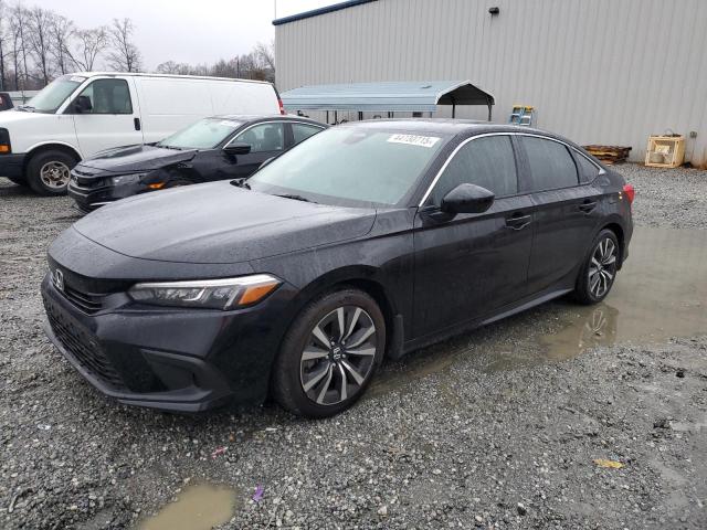 HONDA CIVIC EX 2023 with VIN 2HGFE1F79PH325520 - Photo from auction
