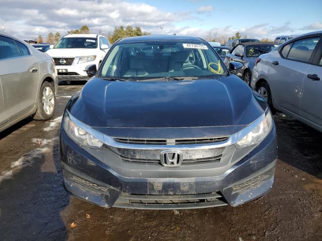Photo 5 from auction – 2017 HONDA CIVIC LX with VIN 19XFC2F50HE064493