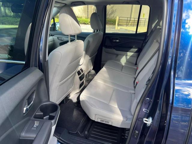 Photo 6 from auction – 2023 HONDA RIDGELINE with VIN 5FPYK3F54PB046791