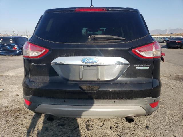 Foto 6 de la subasta – 2014 FORD ESCAPE TIT con VIN 1FMCU0J90EUE57496