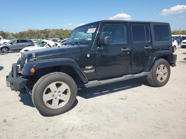 JEEP WRANGLER U 2011 with VIN 1J4HA5H1XBL619601 - Photo from auction