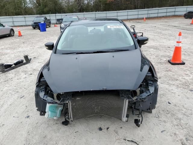 Photo 5 from auction – 2015 FORD FOCUS SE with VIN 1FADP3F27FL251473