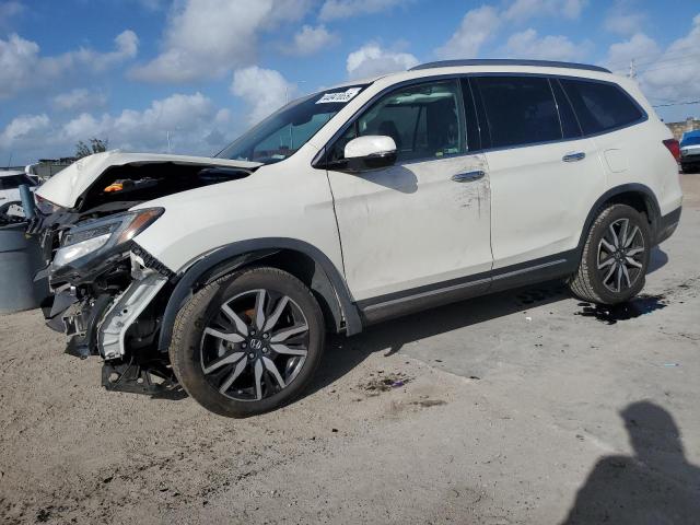 HONDA PILOT ELIT 2019 with VIN 5FNYF6H02KB010963 - Photo from auction