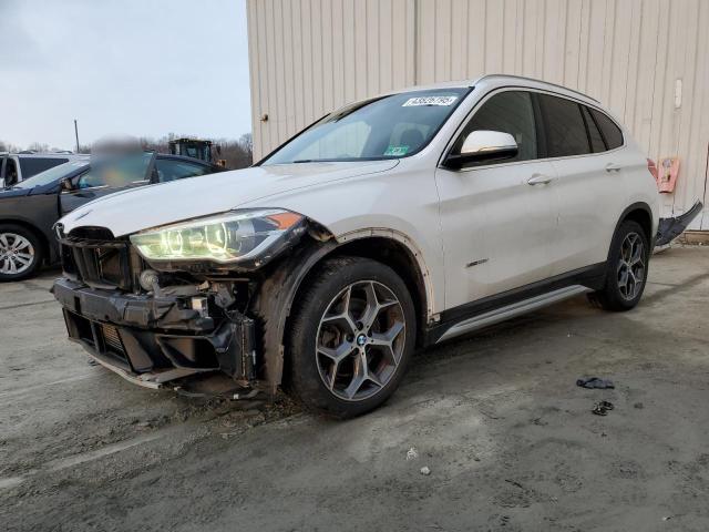 BMW X1 XDRIVE2 2017 with VIN WBXHT3C31H5F70059 - Photo from auction