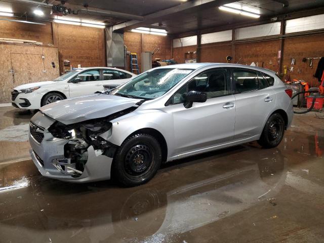 SUBARU IMPREZA 2017 with VIN 4S3GTAA65H3722623 - Photo from auction