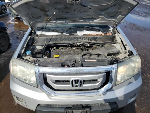 Photo 12 from auction – 2009 HONDA PILOT TOUR with VIN 5FNYF48909B042713