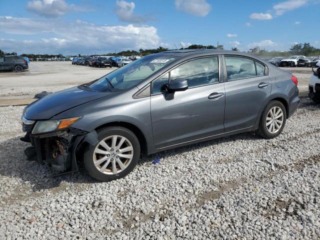 HONDA CIVIC EXL 2012 with VIN 2HGFB2F99CH525341 - Photo from auction