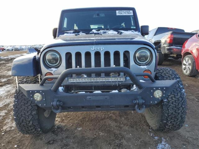 Photo 5 from auction – 2013 JEEP WRANGLER U with VIN 1C4BJWDG4DL586397