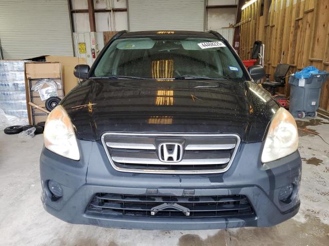 Photo 5 from auction – 2006 HONDA CR-V LX with VIN JHLRD68596C026105