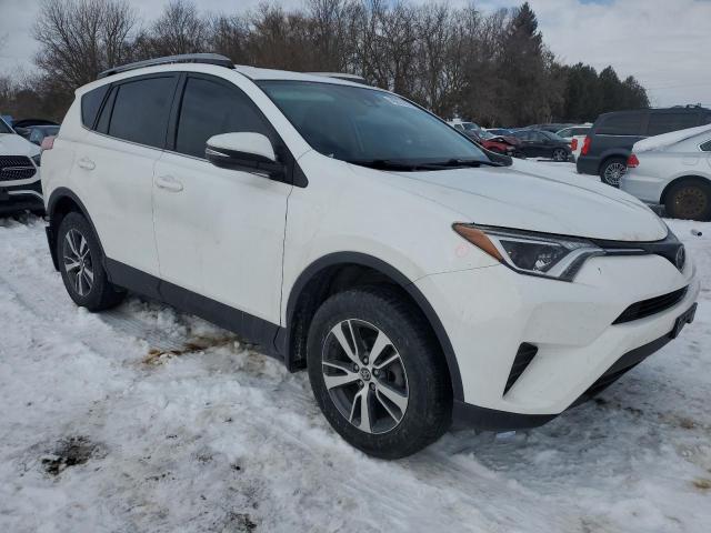Photo 4 from auction – 2018 TOYOTA RAV4 LE with VIN 2T3ZFREV3JW481146