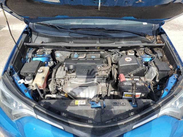 Photo 11 from auction – 2018 TOYOTA RAV4 LE with VIN JTMZFREV0JJ174791