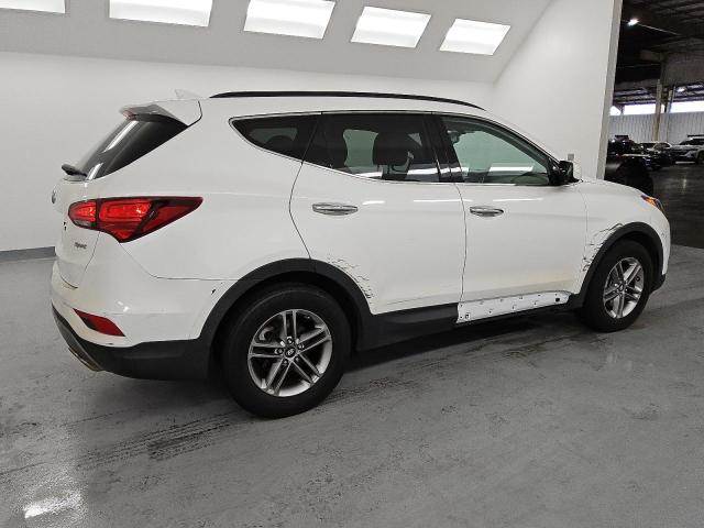 Photo 3 from auction – 2017 HYUNDAI SANTA FE S with VIN 5NMZU3LB5HH028155