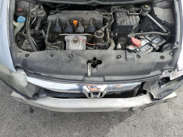 Photo 11 from auction – 2010 HONDA CIVIC LX with VIN 19XFA1F58AE077594