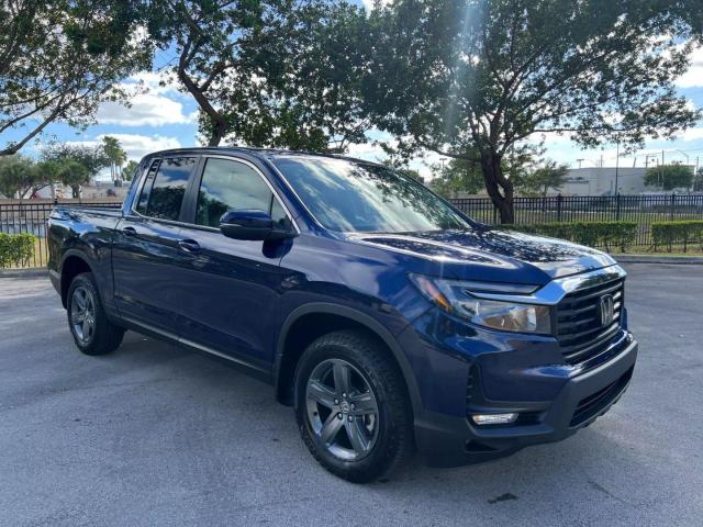 Photo 1 from auction – 2023 HONDA RIDGELINE with VIN 5FPYK3F54PB046791