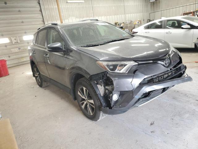 Photo 4 from auction – 2017 TOYOTA RAV4 XLE with VIN 2T3RFREV6HW668648