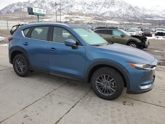 Photo 4 from auction – 2021 MAZDA CX-5 SPORT with VIN JM3KFBBM1M0312215