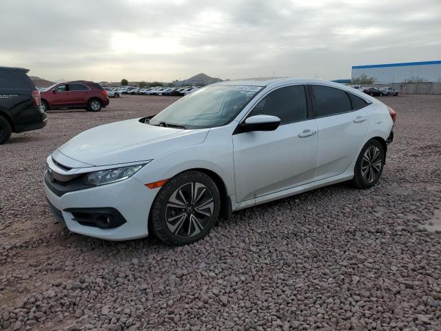 Photo 1 from auction – 2018 HONDA CIVIC EX with VIN JHMFC1F3XJX003519