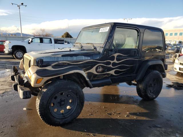 JEEP WRANGLER / 2002 with VIN 1J4FA59S82P740585 - Photo from auction