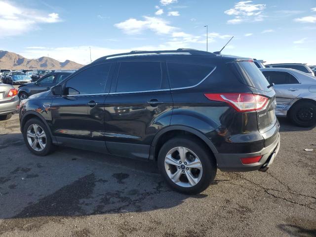 Photo 2 from auction – 2014 FORD ESCAPE SE with VIN 1FMCU9G92EUB12014