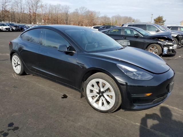 Photo 4 from auction – 2023 TESLA MODEL 3 with VIN 5YJ3E1EA3PF436276