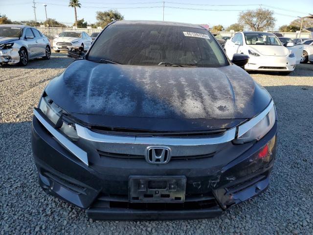 Photo 5 from auction – 2017 HONDA CIVIC EX with VIN 2HGFC2F77HH509075