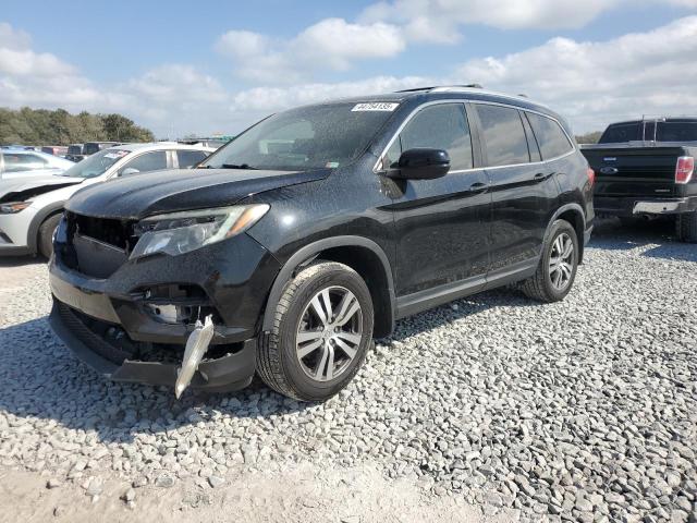 HONDA PILOT EXL 2016 with VIN 5FNYF5H52GB048383 - Photo from auction
