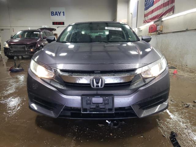 Photo 5 from auction – 2016 HONDA CIVIC LX with VIN 19XFC2F53GE027498