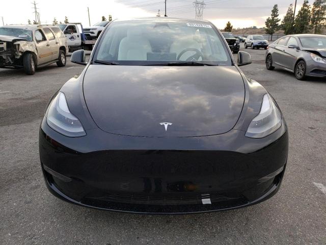 Photo 5 from auction – 2023 TESLA MODEL Y with VIN 7SAYGDEE6PF882994